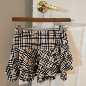 CHERYL KIDS CREATIONS. Skort in black and tan